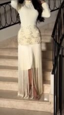 فستان سهرةبتطريز وياقة عالية بخرز وهدب وخامة باربي