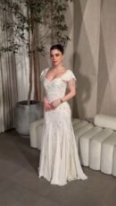 فستان سهرة كلوش  شولدر بهدب بخامة جورجيت مع خرز وكلفة